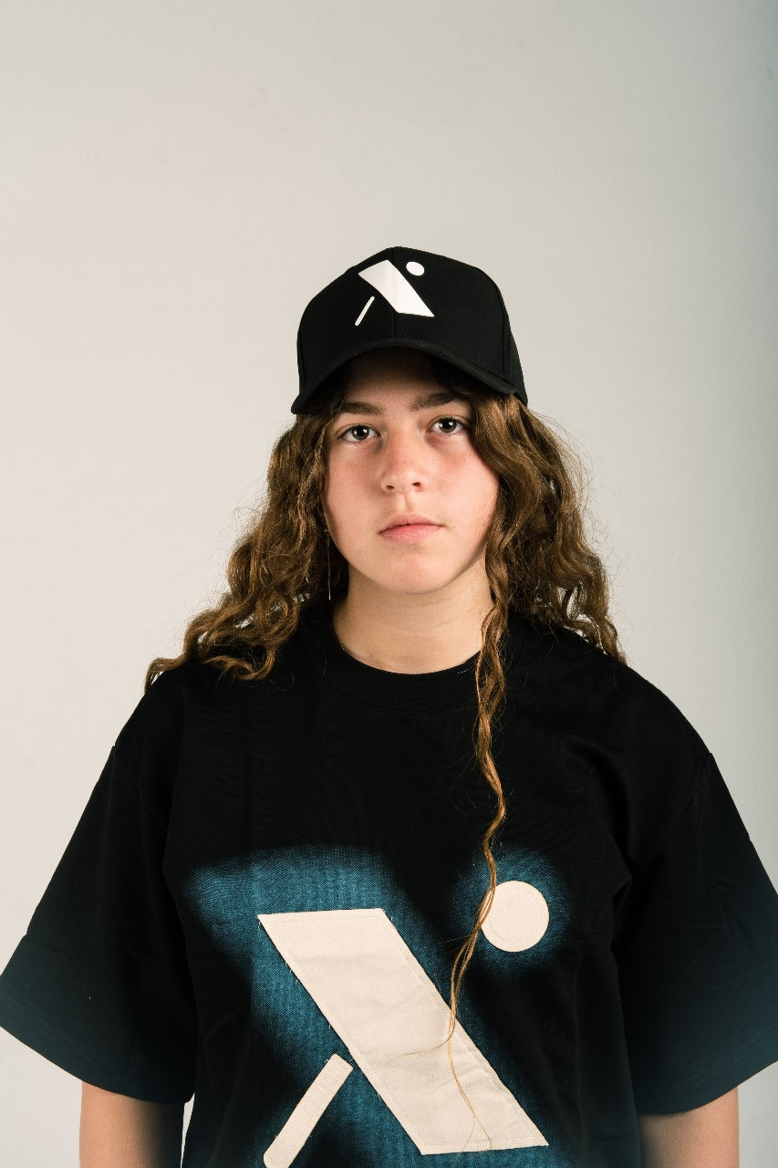 X Cap